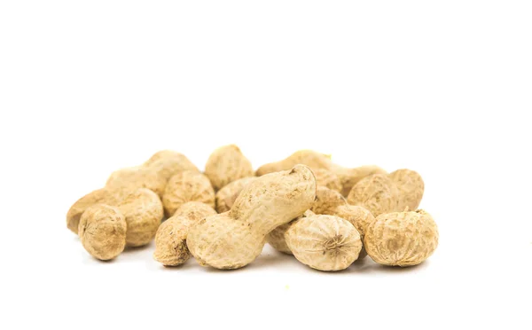 Close-up alguns amendoins isolados — Fotografia de Stock
