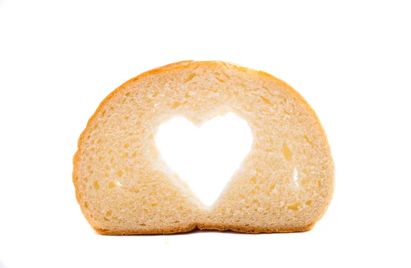 Kromka chleba z symbol serca — Zdjęcie stockowe