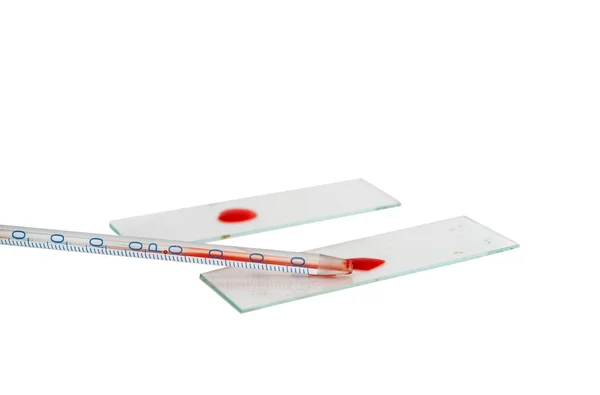 Drop of blood with a pipette isolated — Stock Photo, Image