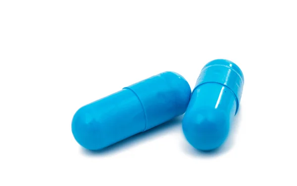 Blue capsules - Stock Photo, Image. 