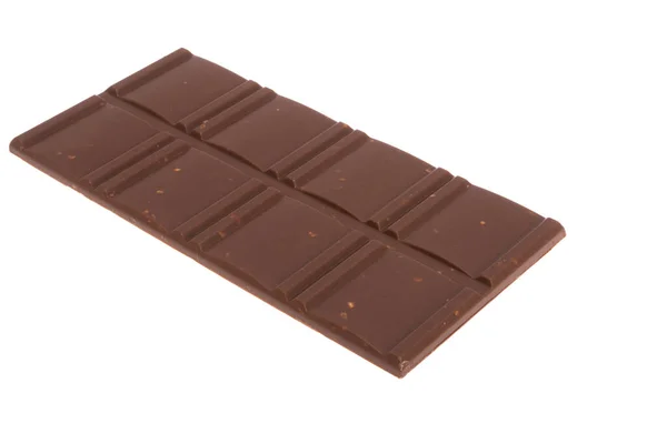 白い背景にナッツが閉じ込められたチョコレート — ストック写真