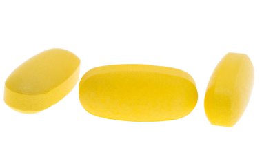 Beyaz arka plan üzerinde izole sarı hap