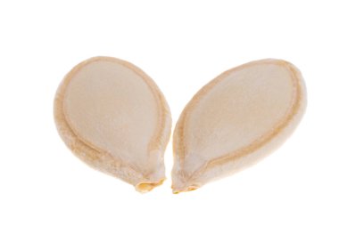 Beyaz arkaplanda izole edilmiş kabak tohumları