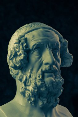 Bronze color gypsum copy of ancient statue Homer head for artists. Plaster antique sculpture of human face. Ancient greek poet and philosopher Homer is the legendary author of poems Iliad and Odyssey. clipart