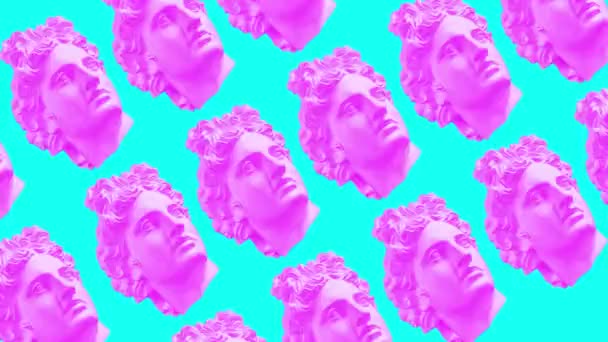 Vaporwave gestileerd met roze geel groene antieke bustes van een Griek op verandering achtergrond. Figurines van de oude man gezicht. Stop bewegingsanimatie. Apollo god sculptuur. Video 4K. Klassiek standbeeld hoofd. GIF — Stockvideo