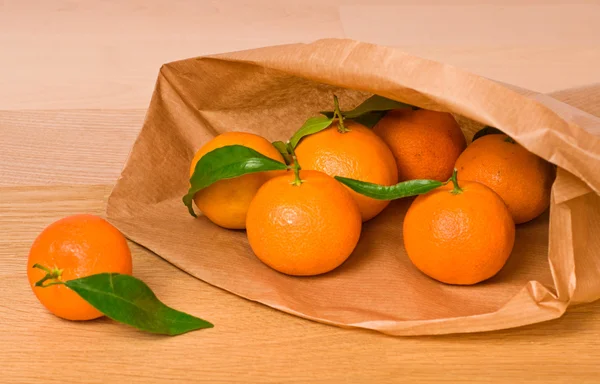 Mandarines in paper bag — Stock Photo, Image