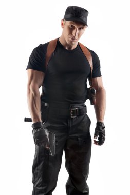 Police officer with gun is looking on you clipart
