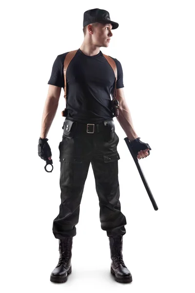 Policejní důstojník s pouty a obušek. izolované na bílém. — Stock fotografie