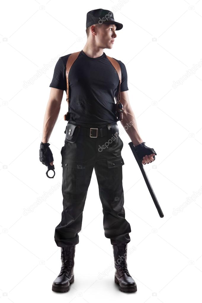 Police officer with handcuffs and baton. Isolated on white.