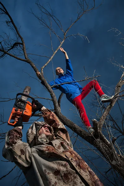 Maniac with the chainsaw — Stock Photo, Image