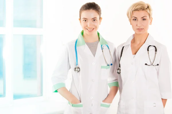 Two young doctors in hospital — Stock Photo, Image