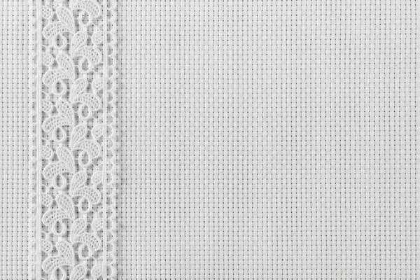 Fabrics for embroidery a cross, lace and ribbons — Stock Photo, Image