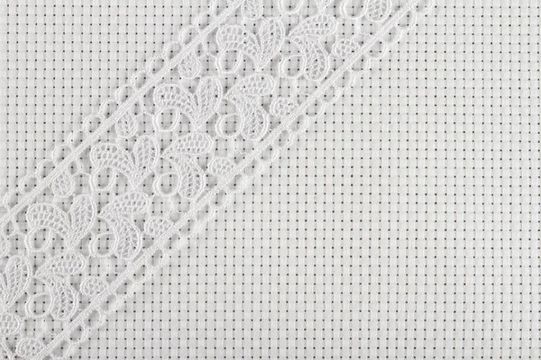 Fabrics for embroidery a cross, lace and ribbons — Stock Photo, Image