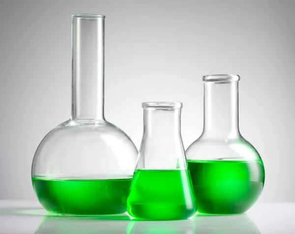 Test-tubes with green liquid — Stock Photo, Image