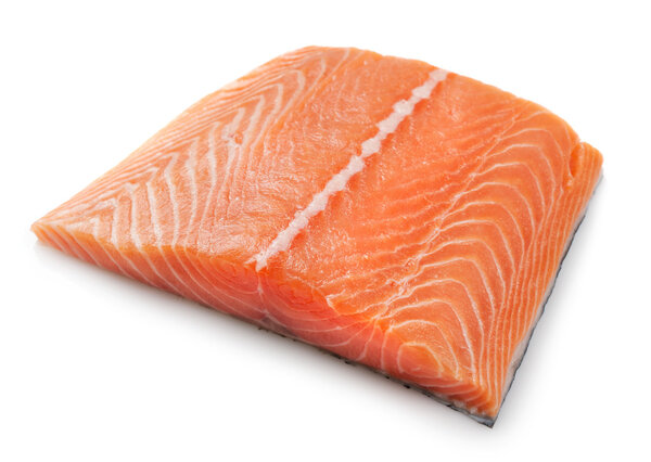 Piece of salmon fish over white