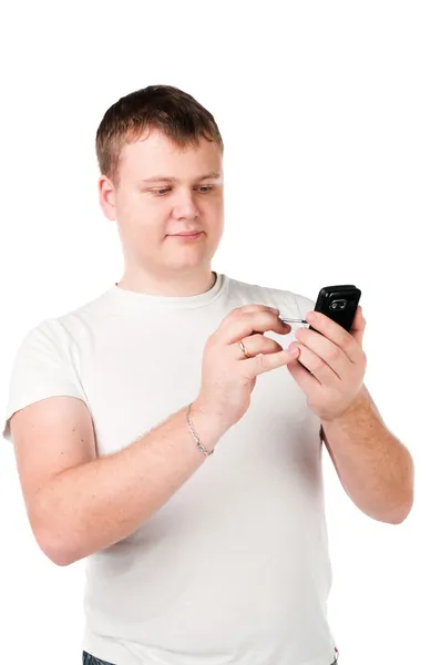 Young casual man with phone — Stock Photo, Image