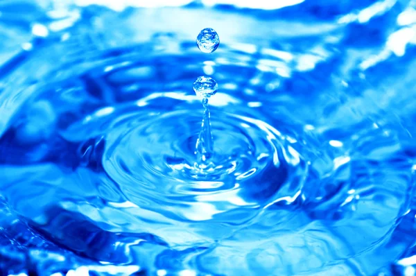 Blue water splash — Stock Photo, Image