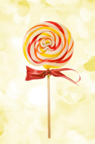 Lovely Lollipop on holiday lights — Stock Photo, Image