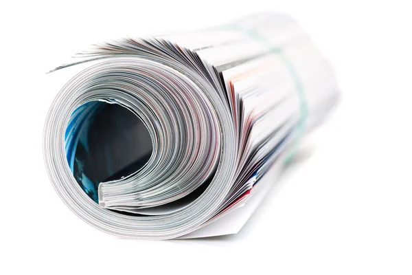 Magazine roll on white background — Stock Photo, Image