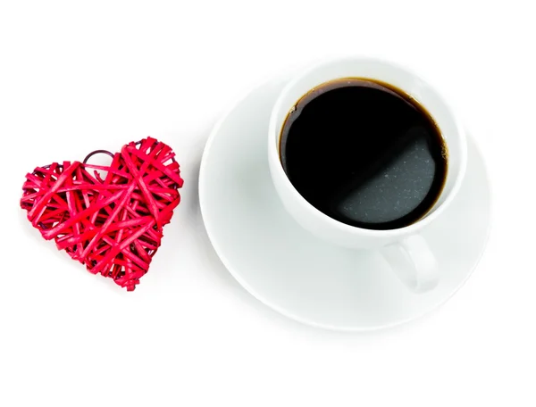 Червона солома серце і чашка кави — стокове фото