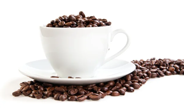 Cup full of coffee beans Stock Photo