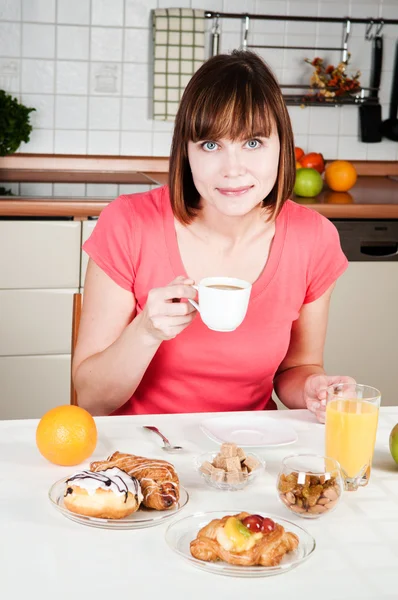 Young woman enjoying a cup of coffee Stock Photo
