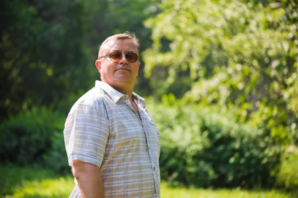 Portrait Of Man Standing Outside In summer Landscape — Stock Photo, Image