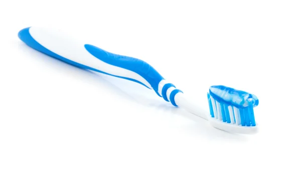 Зубная щетка и паста — стоковое фото