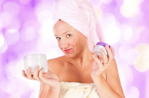 Beautiful woman tender jar of moisturizer cream. — Stock Photo, Image