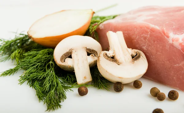 Raw fresh meat on board with condiments — Stock Photo, Image