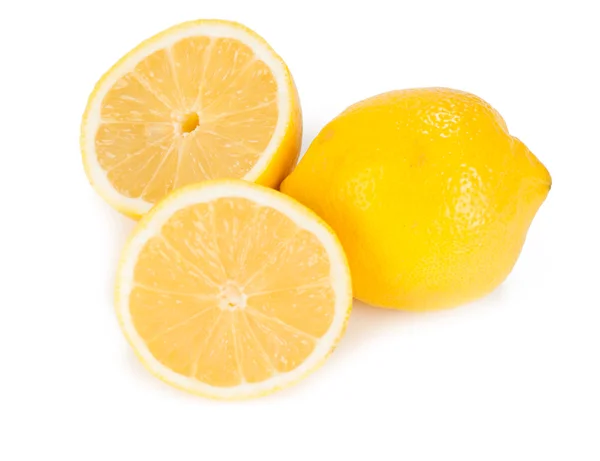 Closeup of half lemon and wellness one on white background — Stock Photo, Image