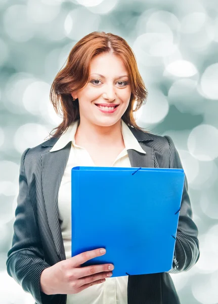 Business woman holding a portfolio — Stock Photo, Image