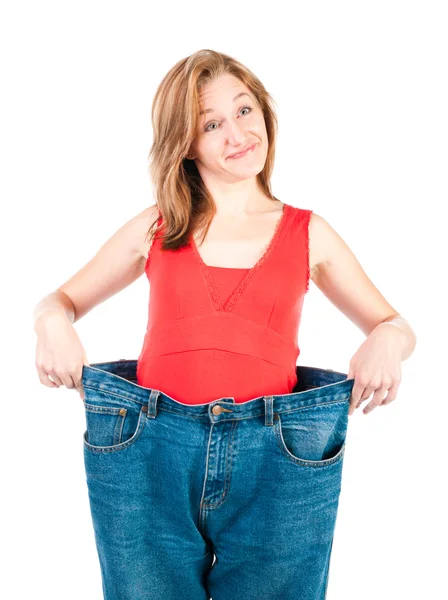 A slim young woman makes good diet Stock Image