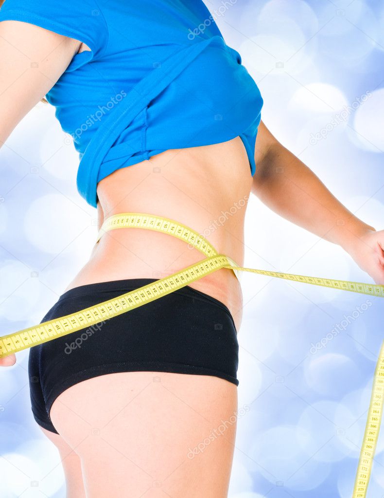 woman diet concept with measuring tape