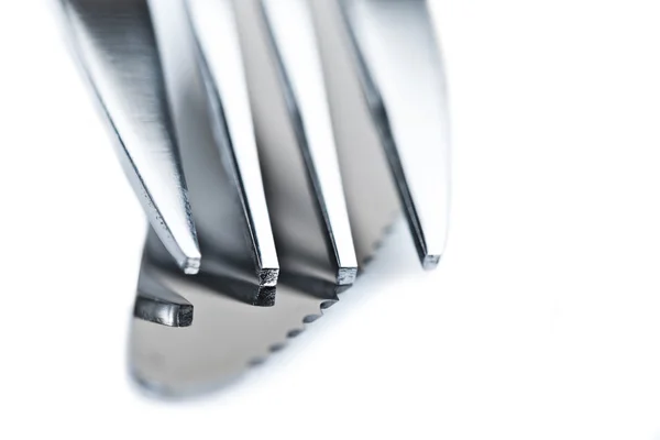 Cuchillo y tenedor aislados sobre fondo blanco — Foto de Stock