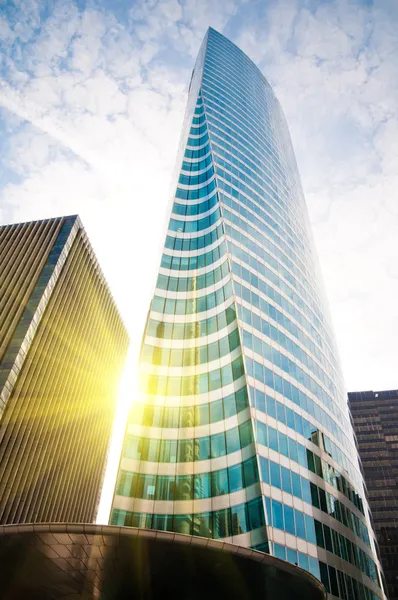 Modern buildings with sun — Stock Photo, Image