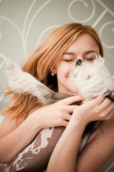 Woman with a cute little dog — Stock Photo, Image