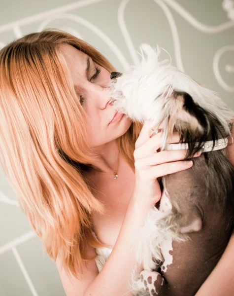 Woman with a cute little dog — Stock Photo, Image