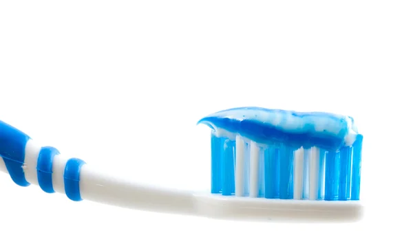 Cepillo dental y con pasta —  Fotos de Stock