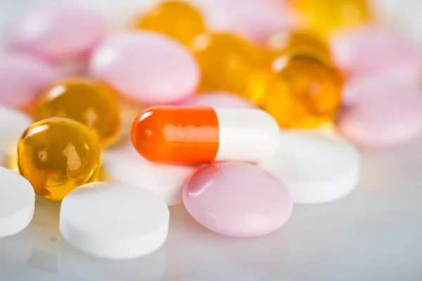 Colorful tablets with capsules — Stock Photo, Image