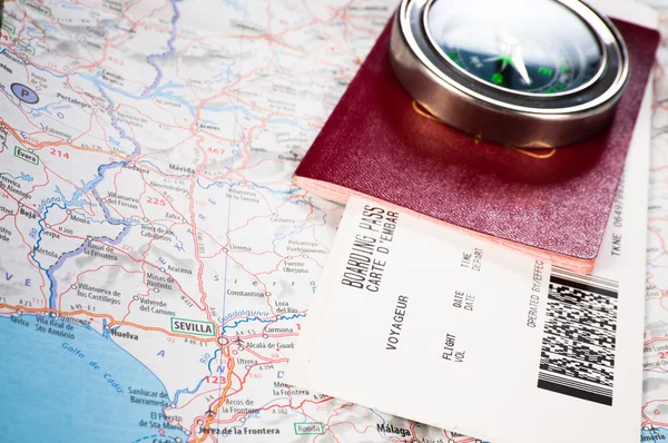 Compass and passport with boarding pass — Stock Photo, Image