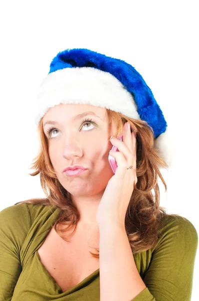 A menina de Natal fala ao telefone. Isolado sobre fundo branco — Fotografia de Stock