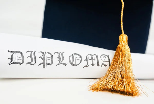 Graduation hat and Diploma — Stock Photo, Image