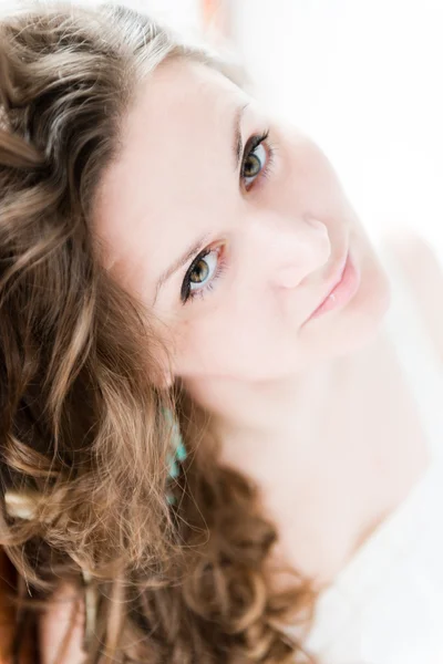 Portrait of beautiful young happy smiling woman with long curly — Stock Photo, Image