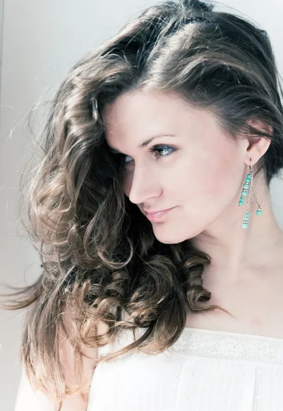 Portrait of beautiful young happy smiling woman with long curly — Stock Photo, Image