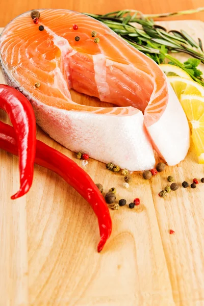 Salmon with lemon and pepper — Stock Photo, Image