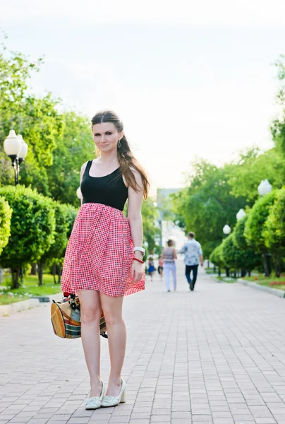 Pretty young woman outdoor with smoky eye makeup — Stock Photo, Image