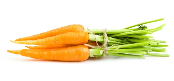 Zanahorias grasosas con hojas sobre blanco —  Fotos de Stock