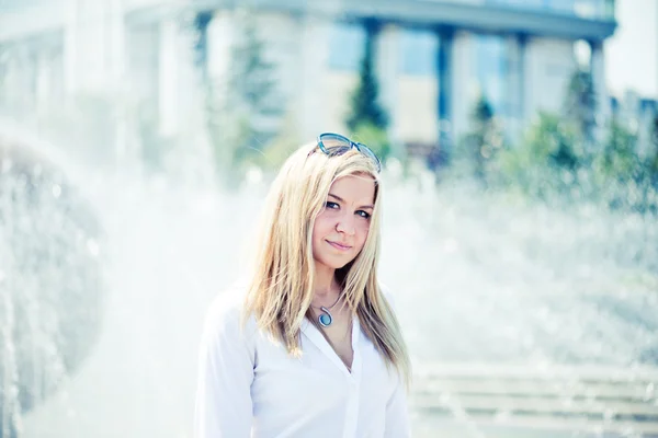 Beautiful young blond woman outdoors portrait — Stock Photo, Image