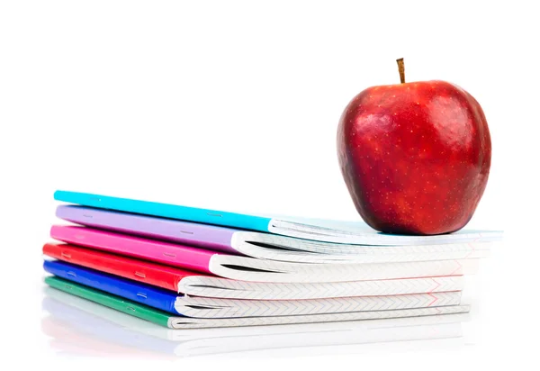 Apple on writing-books. school concept — Stock Photo, Image